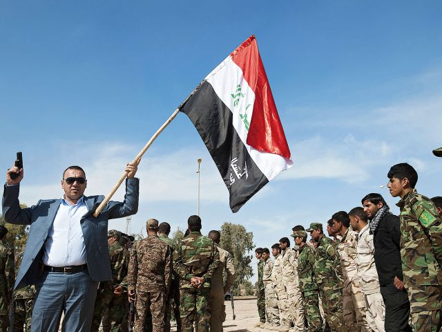 Nastoupené šíitské milice Badr. V boji proti Islámskému státu z jihu a východu představují šíítské milice jedinou relevatní sílu, pro sunnitské obyvatelstvo jsou ale symbolem teroru.